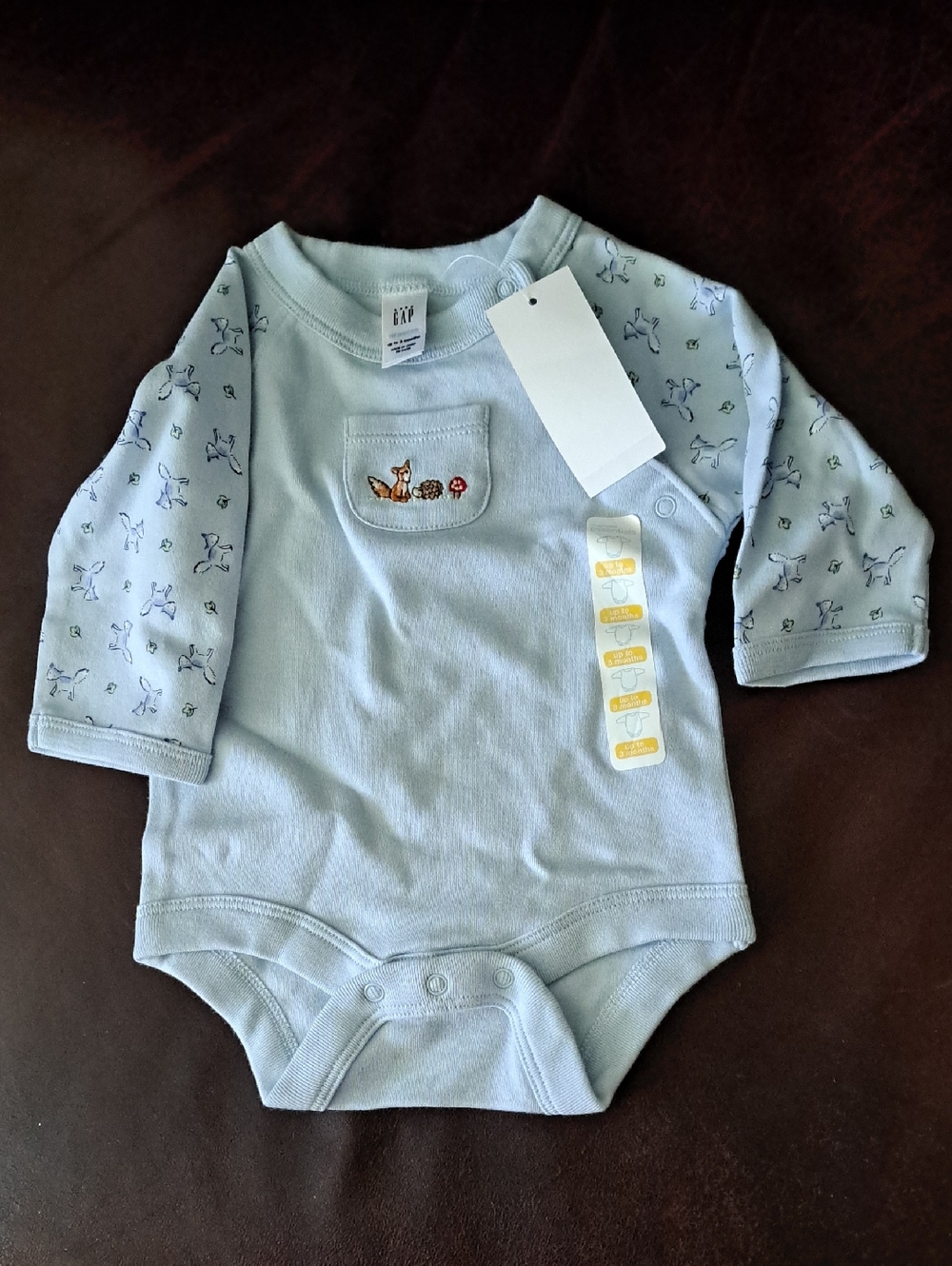 GAP Light Blue Newborn Onesie with Woodland Pocket Embroidery